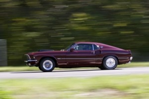 Ford Mustang Mach 1 racing during a car rally.