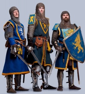 Three medieval knights isolated on grey background